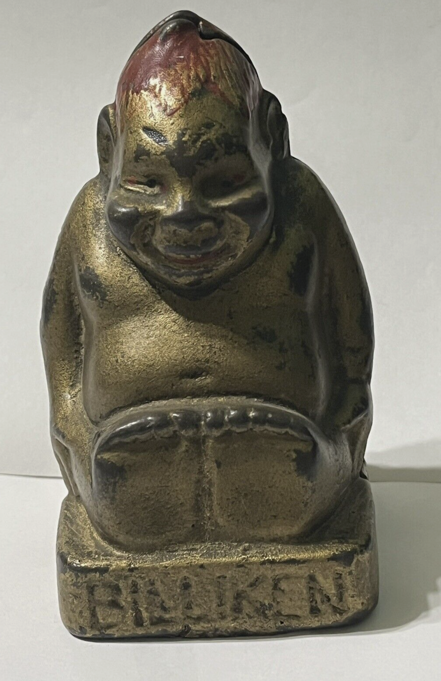 cast iron Billiken coin bank, c. 1908