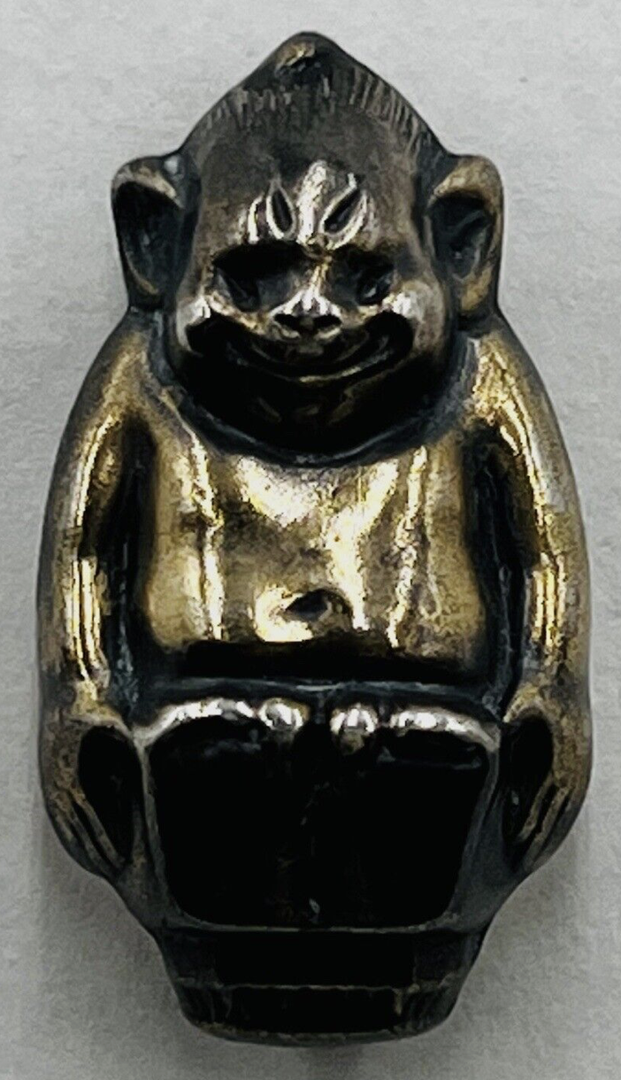 sterling silver Billiken pin, ca. 1910